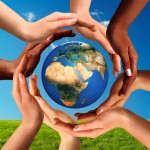 Multiracial Hands Together Around World Globe